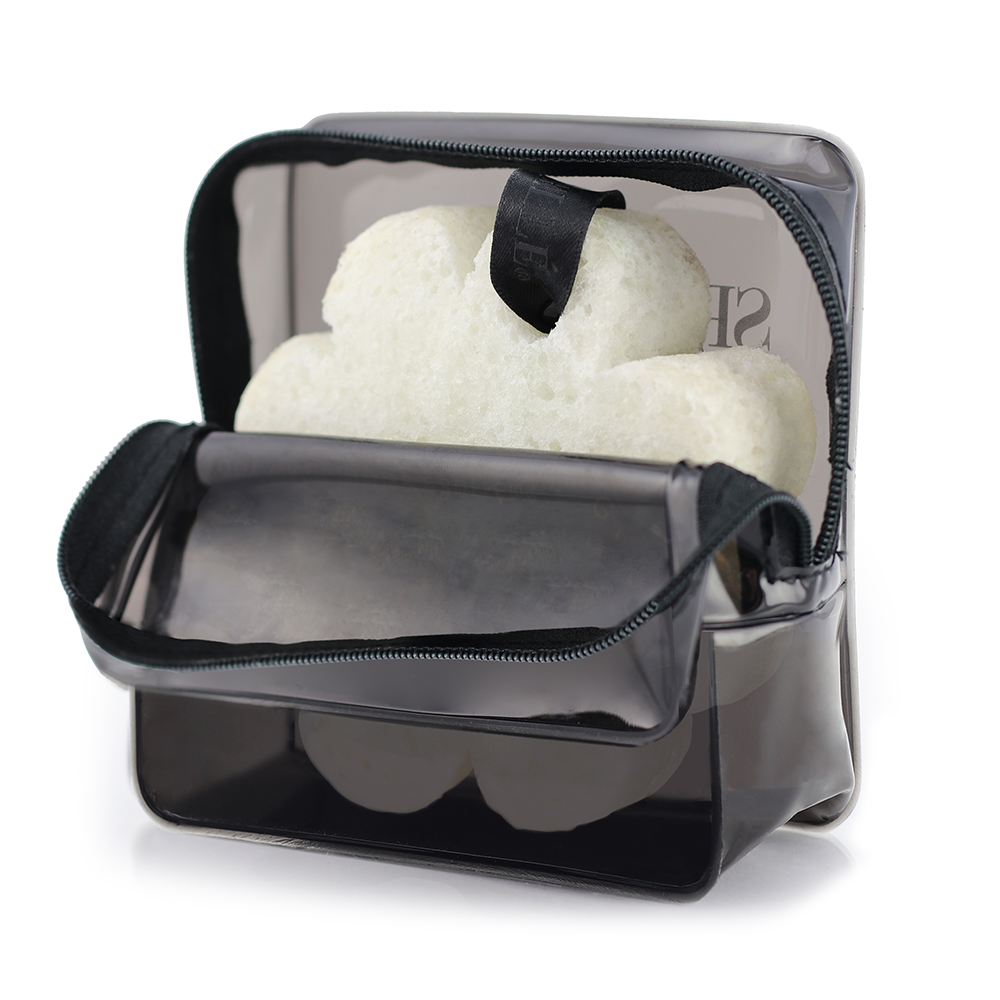 Angled front view with bag zipped and handles upright.